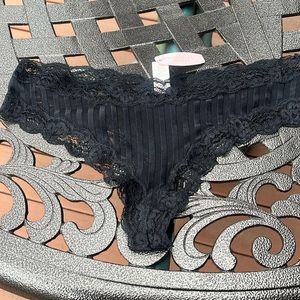 New with tags. Victorias Secret black lace thong panties. Size Medium